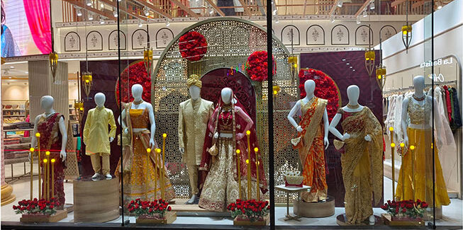 Visual merchandise design for Jetha Tulsidas, Mauritius using flowers and lights to celebrate the Indian bridal collection.